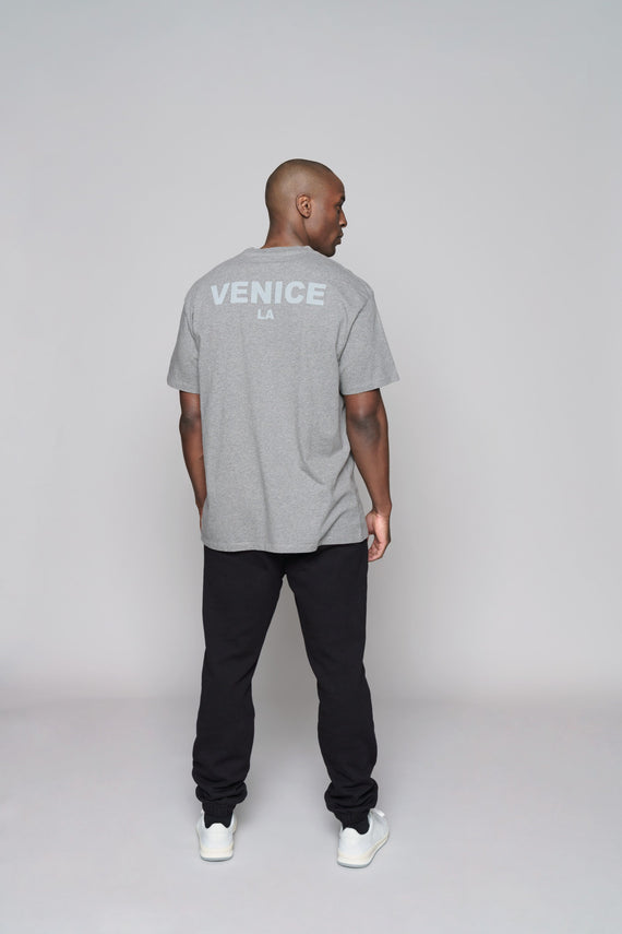 back of grey oversized crew with Venice LA text