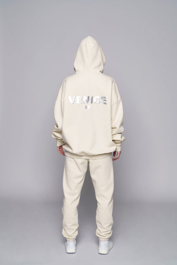 back of white hoodie with shiny VENICE LA text on back